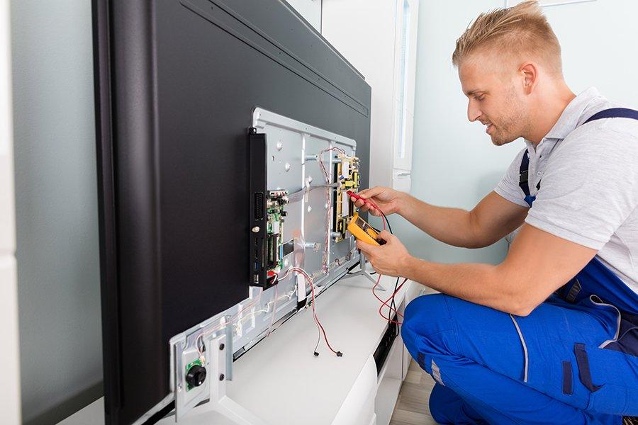 Technician repairing screen